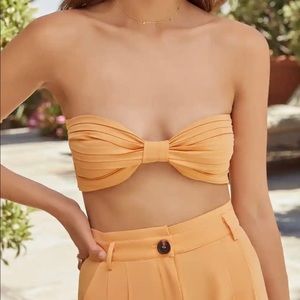 VICI. *Brand New* Never worn. Tangerine Bandeau Top. Size small. Bought for $32.